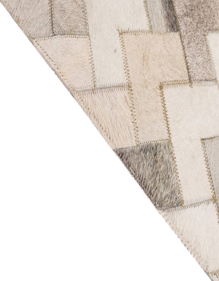 Detail image of  5' 2 x 8' Cowhide - Patchwork Rug