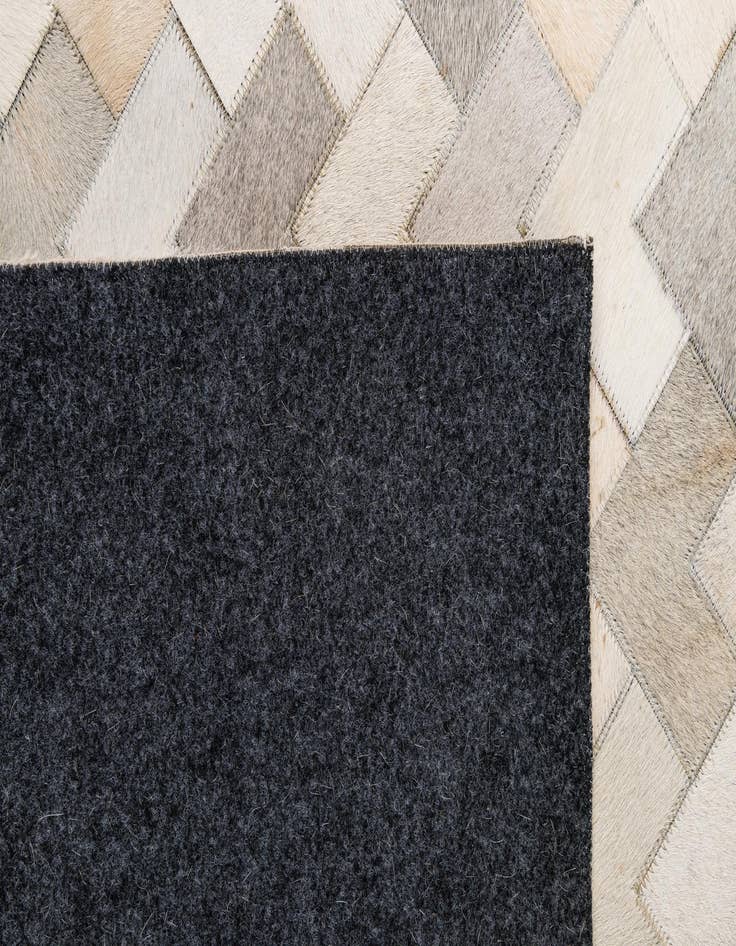 Detail image of  5' 2 x 8' Cowhide - Patchwork Rug