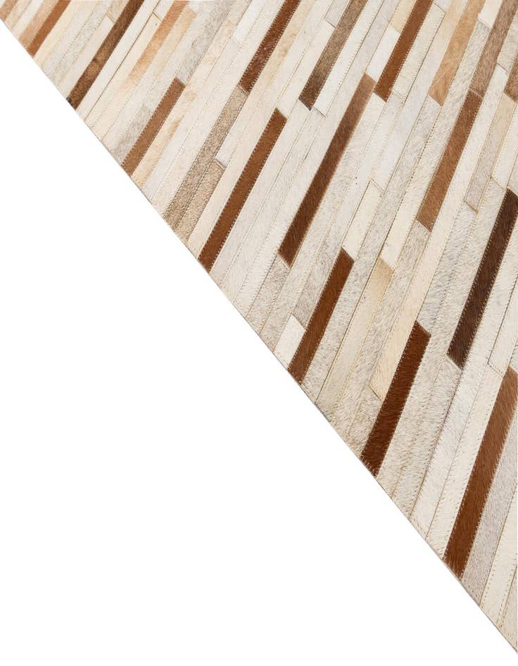 Detail image of  5' 1 x 7' 11 Cowhide - Patchwork Rug