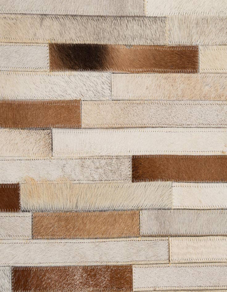 Detail image of  5' 1 x 7' 11 Cowhide - Patchwork Rug