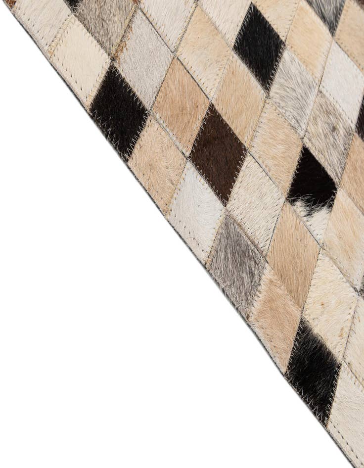 Detail image of  5' 1 x 8' 1 Cowhide - Patchwork Rug