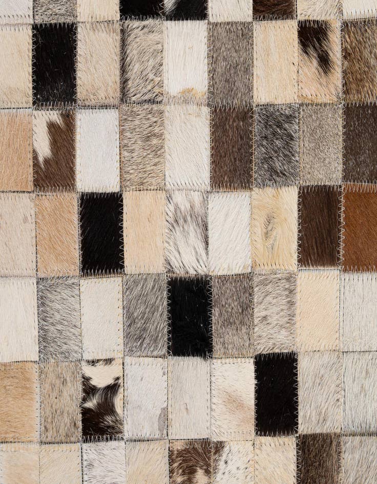 Detail image of  5' 1 x 8' 1 Cowhide - Patchwork Rug