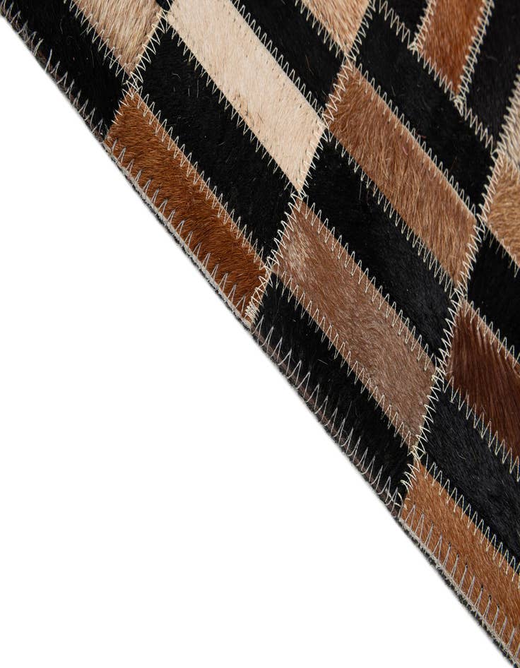 Detail image of  5' 1 x 7' 10 Cowhide - Patchwork Rug