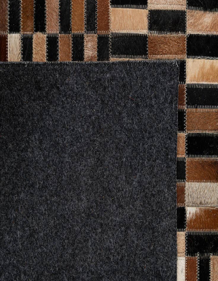 Detail image of  5' 1 x 7' 10 Cowhide - Patchwork Rug