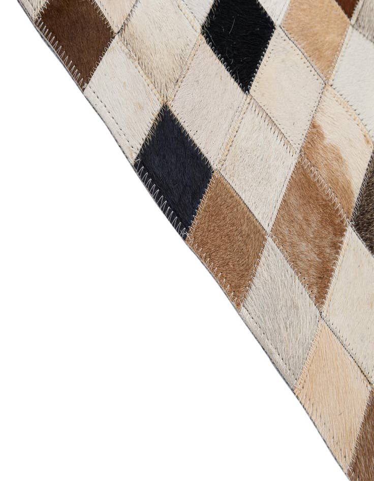 Detail image of  5' 1 x 7' 11 Cowhide - Patchwork Rug