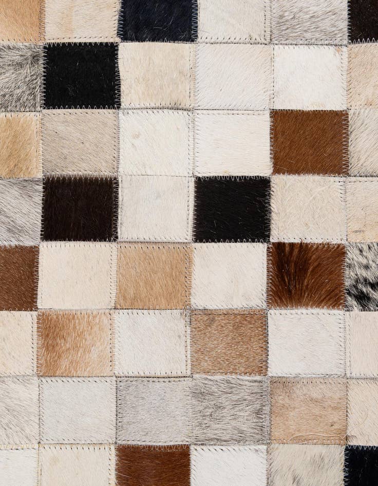 Detail image of  5' 1 x 7' 11 Cowhide - Patchwork Rug
