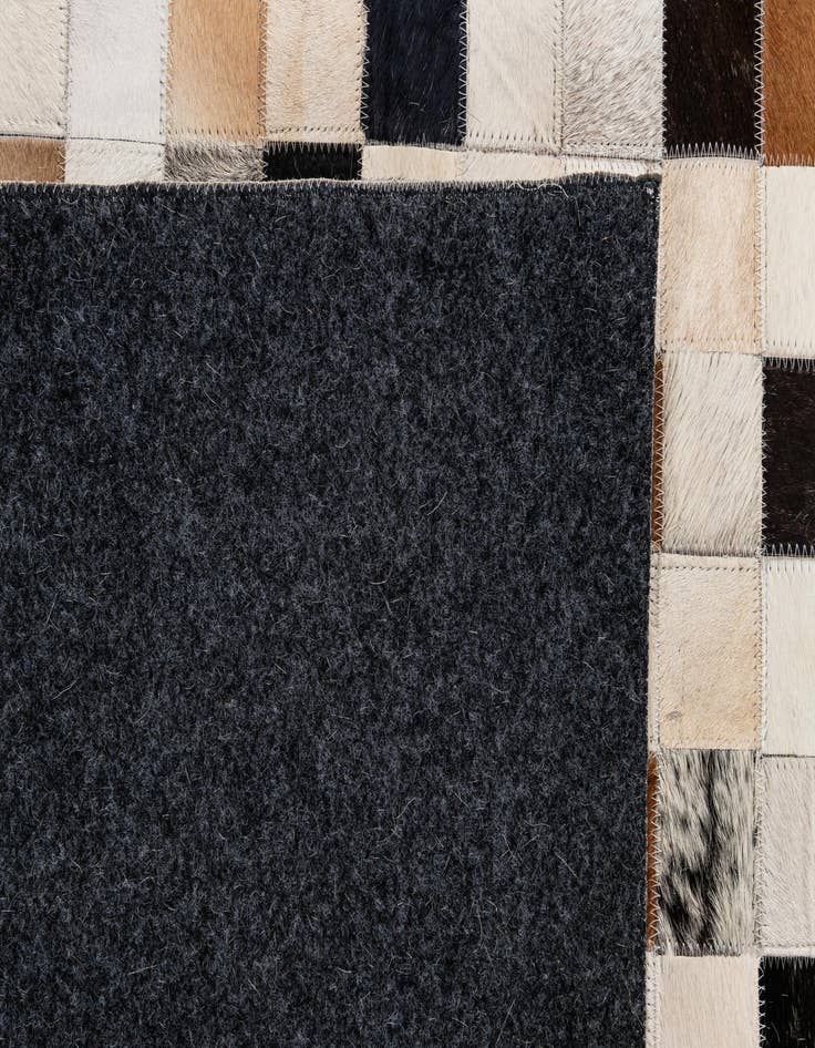 Detail image of  5' 1 x 7' 11 Cowhide - Patchwork Rug