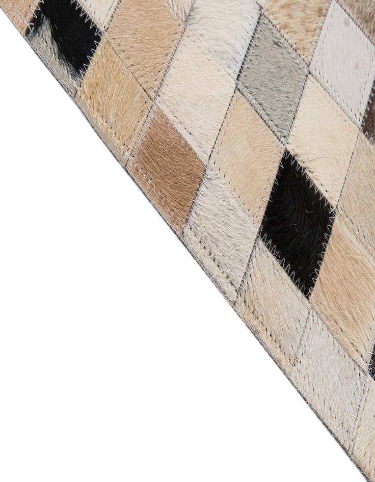 Detail image of  5' 1 x 7' 10 Cowhide - Patchwork Rug