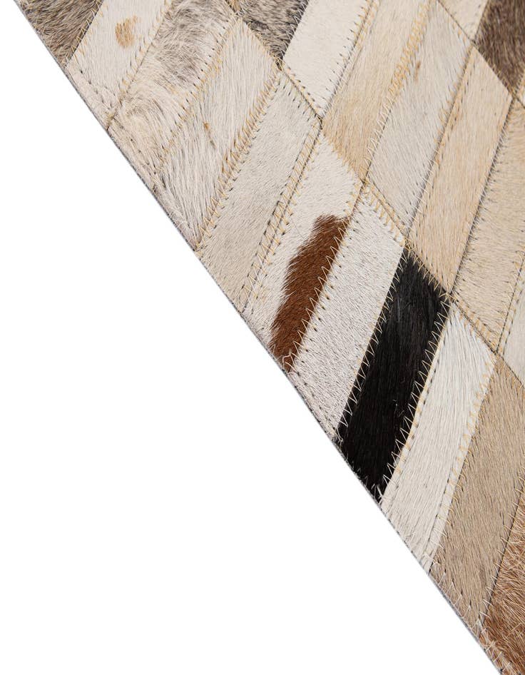 Detail image of  5' 2 x 7' 11 Cowhide - Patchwork Rug