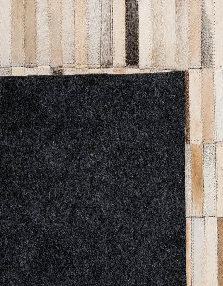 Detail image of  5' 2 x 7' 11 Cowhide - Patchwork Rug