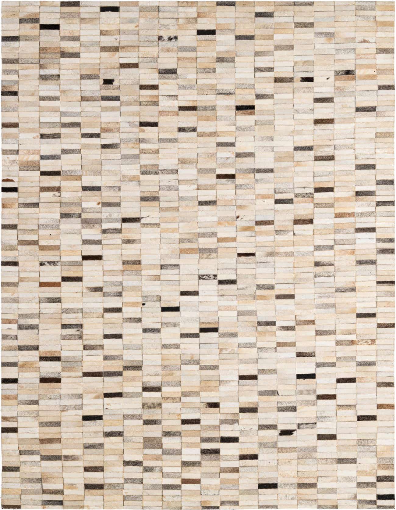 A rectangular 5x8 modern patchwork cowhide rug with multi-colored stripes and a medium pile, ideal for a living room.