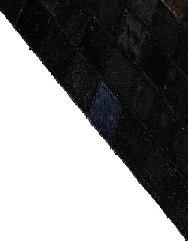 Detail image of  5' 1 x 7' 10 Cowhide - Patchwork Rug