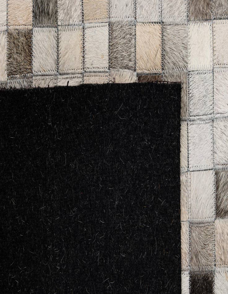 Detail image of  5' 1 x 7' 10 Cowhide - Patchwork Rug