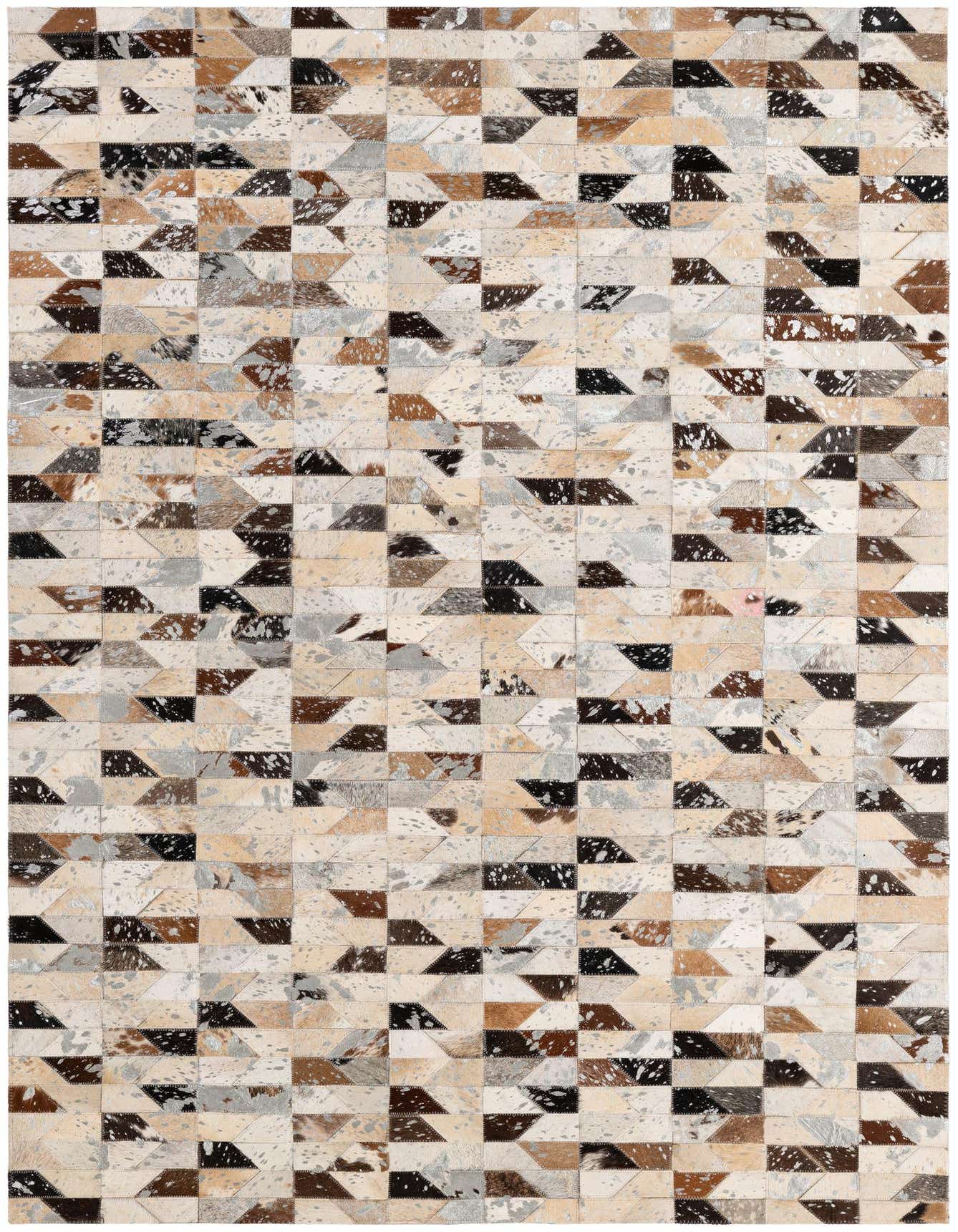 A rectangular 4x6 patchwork cowhide rug featuring a modern geometric pattern in various shades of brown, black, white, and gray.