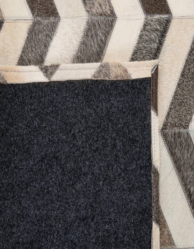 Detail image of  4' 1 x 6' 1 Cowhide - Patchwork Rug