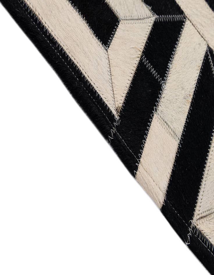 Detail image of  4' 1 x 6' 1 Cowhide - Patchwork Rug