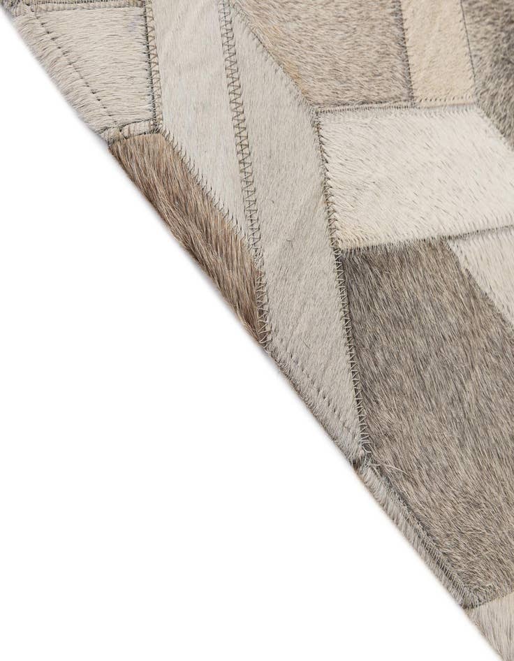 Detail image of  4' 1 x 5' 11 Cowhide - Patchwork Rug
