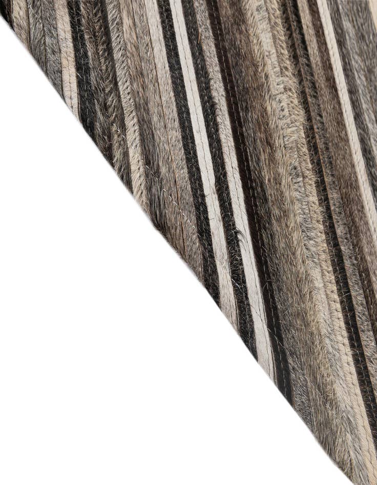 Detail image of  3' 11 x 6' 1 Cowhide - Patchwork Rug