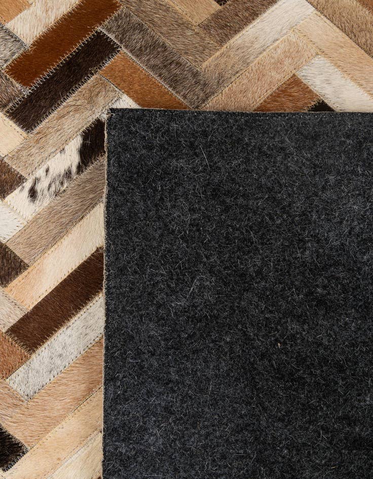 Detail image of  4' 1 x 6' 1 Cowhide - Patchwork Rug