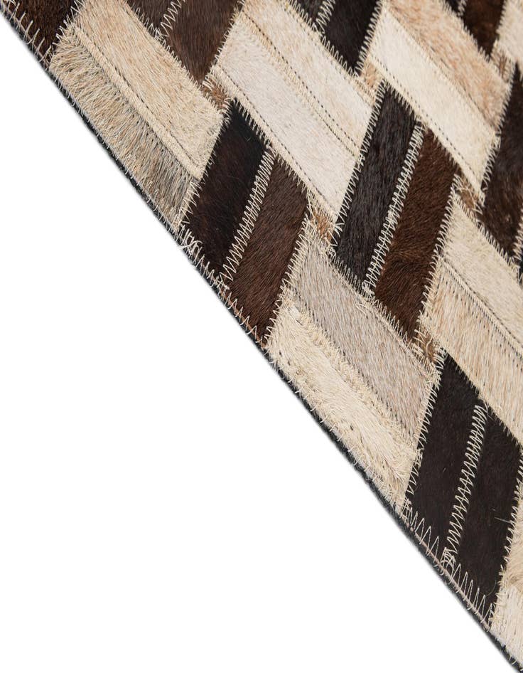 Detail image of  3' 11 x 5' 11 Cowhide - Patchwork Rug