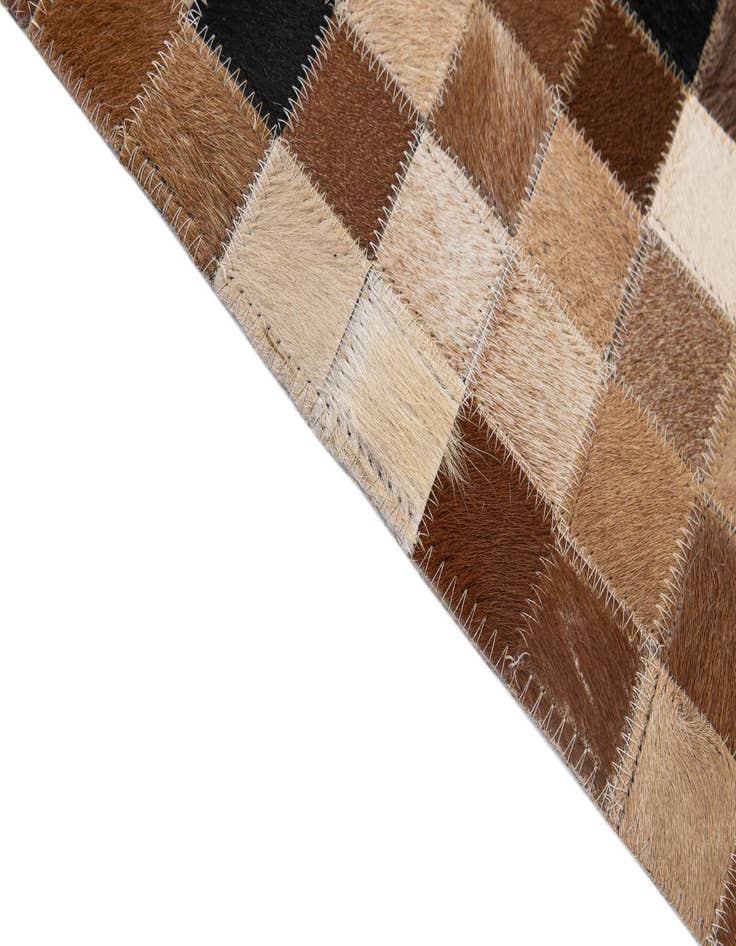 Detail image of  4' 1 x 5' 11 Cowhide - Patchwork Rug