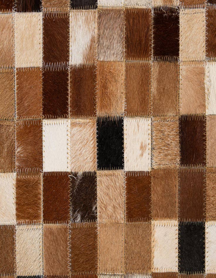 Detail image of  4' 1 x 5' 11 Cowhide - Patchwork Rug