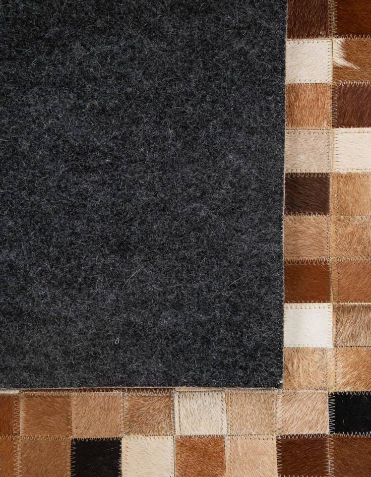 Detail image of  4' 1 x 5' 11 Cowhide - Patchwork Rug