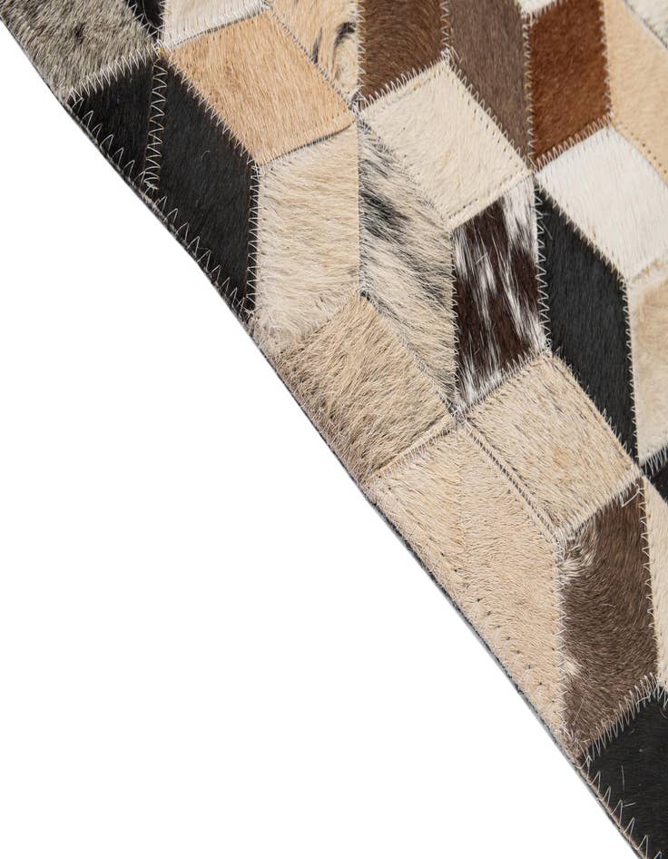 Detail image of  4' 1 x 5' 11 Cowhide - Patchwork Rug