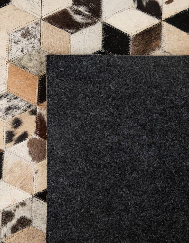 Detail image of  4' 1 x 5' 11 Cowhide - Patchwork Rug