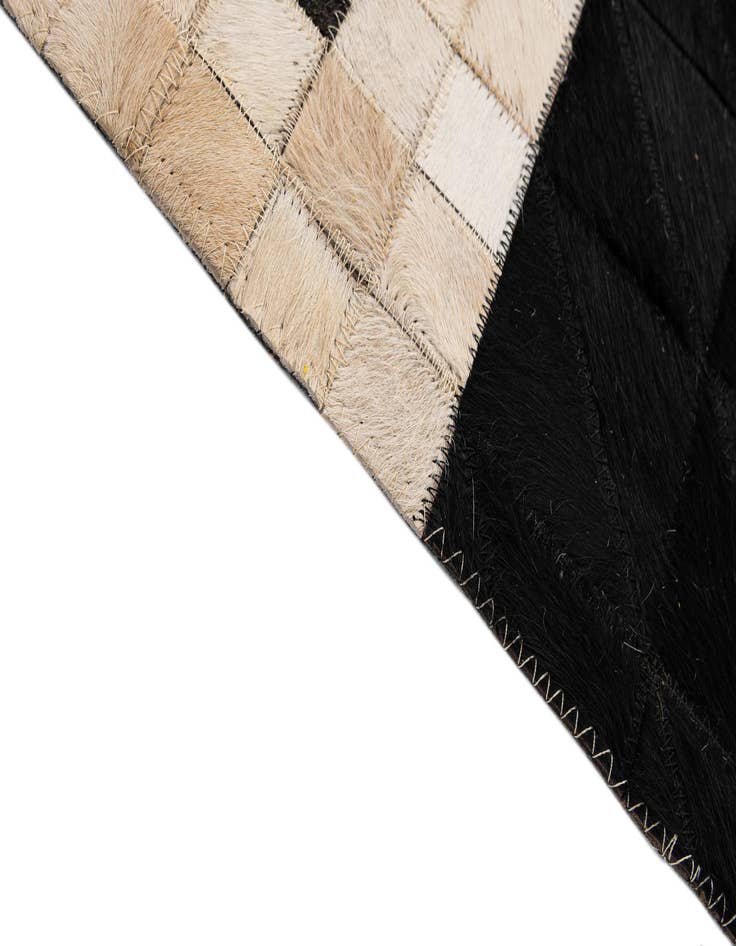 Detail image of  4' 3 x 6' 2 Cowhide - Patchwork Rug