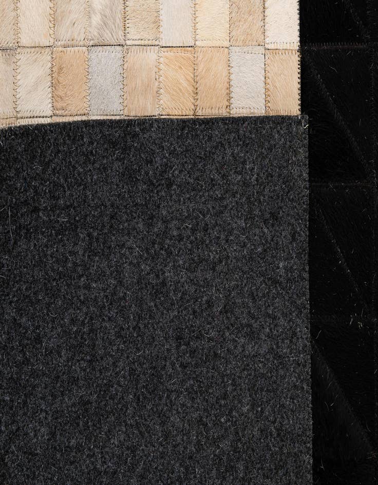 Detail image of  4' 3 x 6' 2 Cowhide - Patchwork Rug