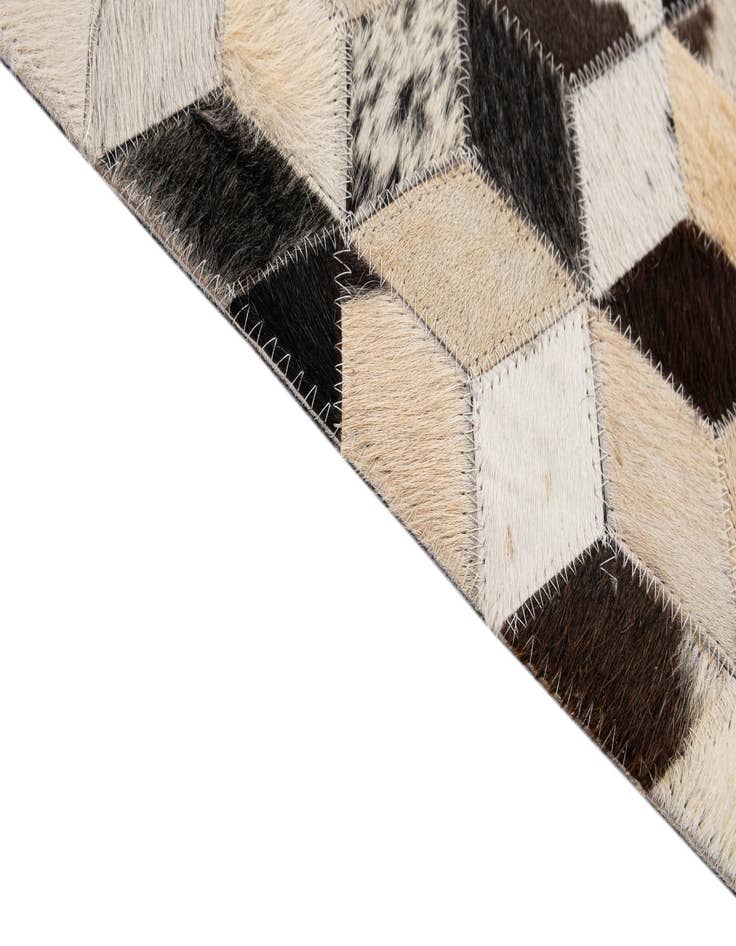 Detail image of  4' 1 x 5' 11 Cowhide - Patchwork Rug