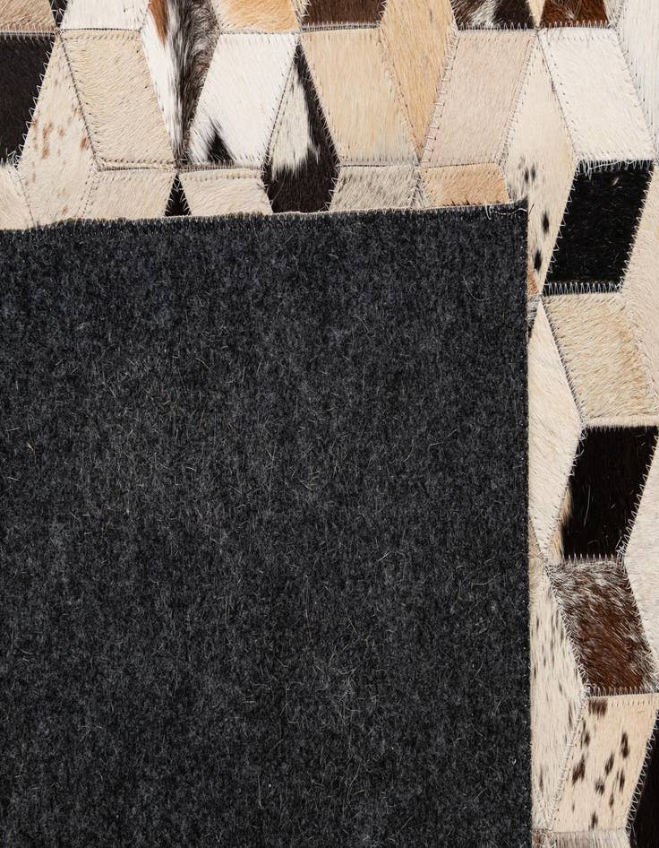 Detail image of  4' 1 x 5' 11 Cowhide - Patchwork Rug