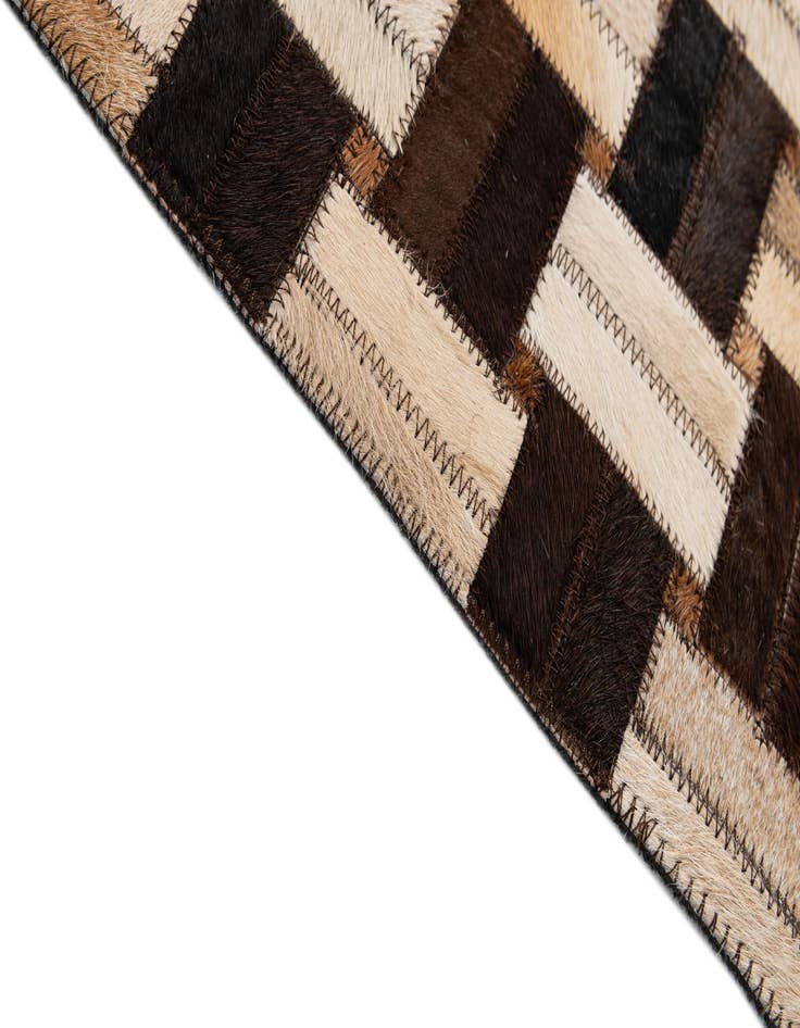 Detail image of  3' 11 x 5' 11 Cowhide - Patchwork Rug