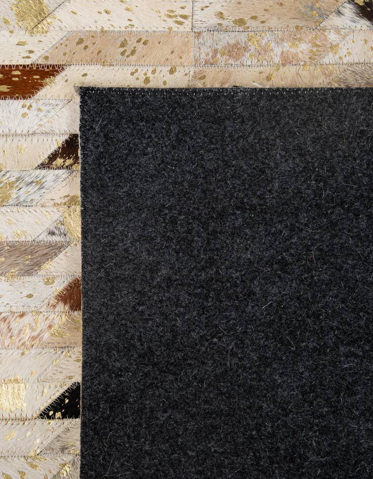 Detail image of  4' 2 x 5' 11 Cowhide - Patchwork Rug