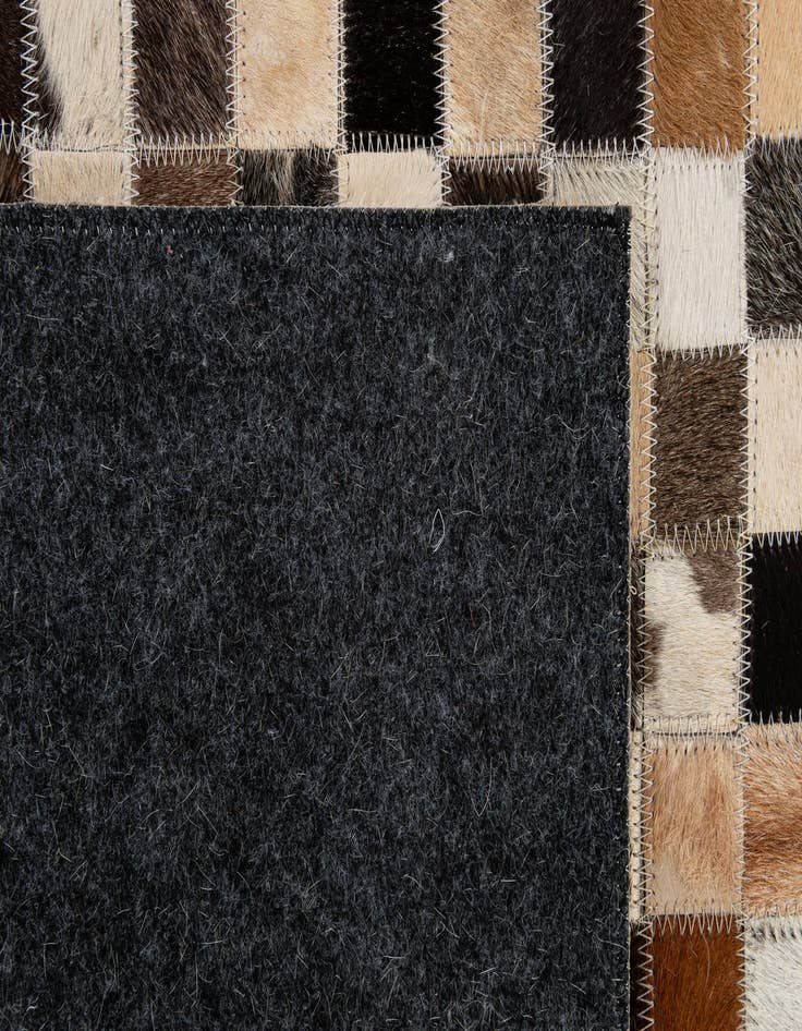 Detail image of  4' 1 x 6' 1 Cowhide - Patchwork Rug