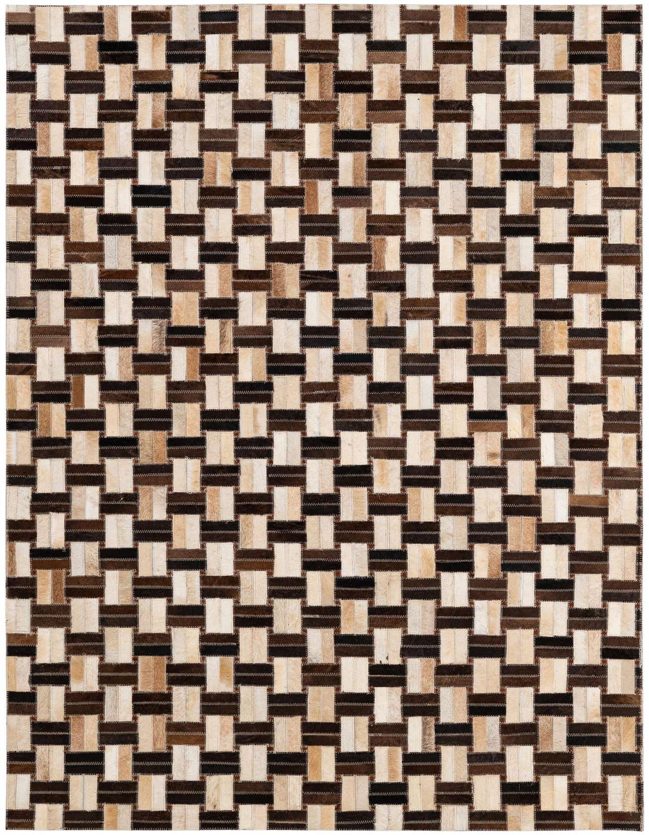 A rectangular 4x6 patchwork cowhide rug featuring a modern stripe pattern in varying shades of brown, beige, and cream.