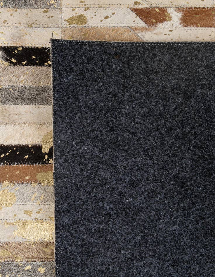 Detail image of  4' 2 x 5' 11 Cowhide - Patchwork Rug