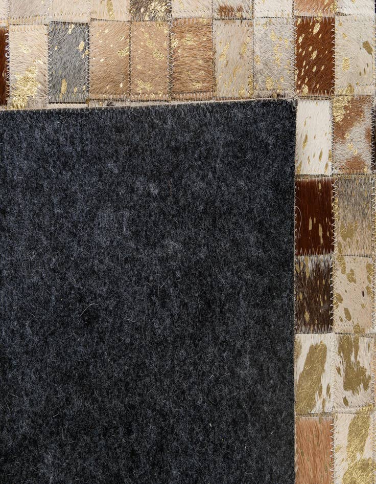 Detail image of  4' 1 x 5' 11 Cowhide - Patchwork Rug