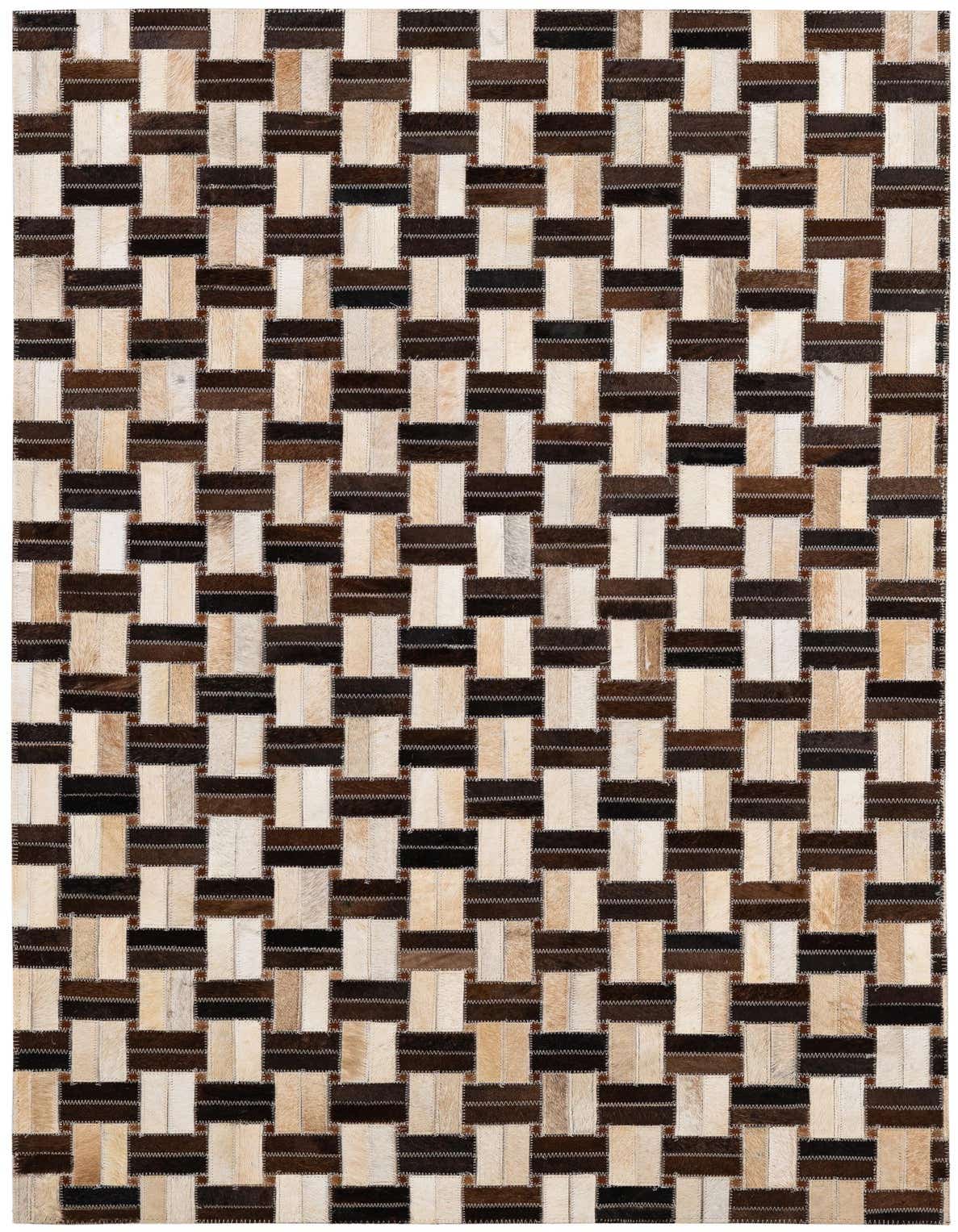 A 3x5 rectangular modern patchwork rug made from multi-colored cowhide and leather, featuring a woven pattern of light and dark brown rectangular patches.