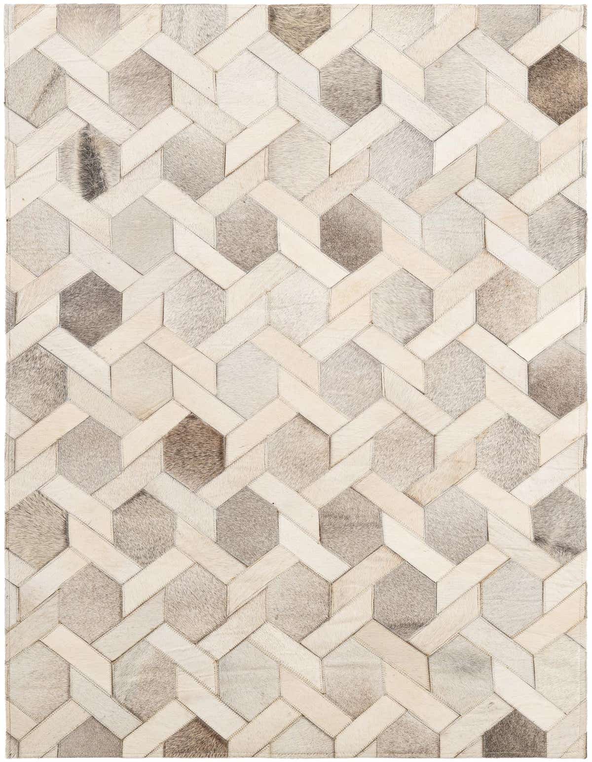 A 3x5 rectangular cowhide rug featuring a modern geometric patchwork design in varying shades of gray, white, and brown.