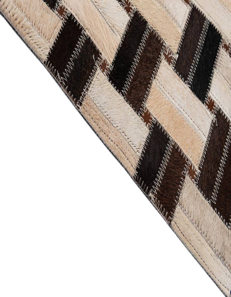 Detail image of  3' 1 x 4' 11 Cowhide - Patchwork Rug