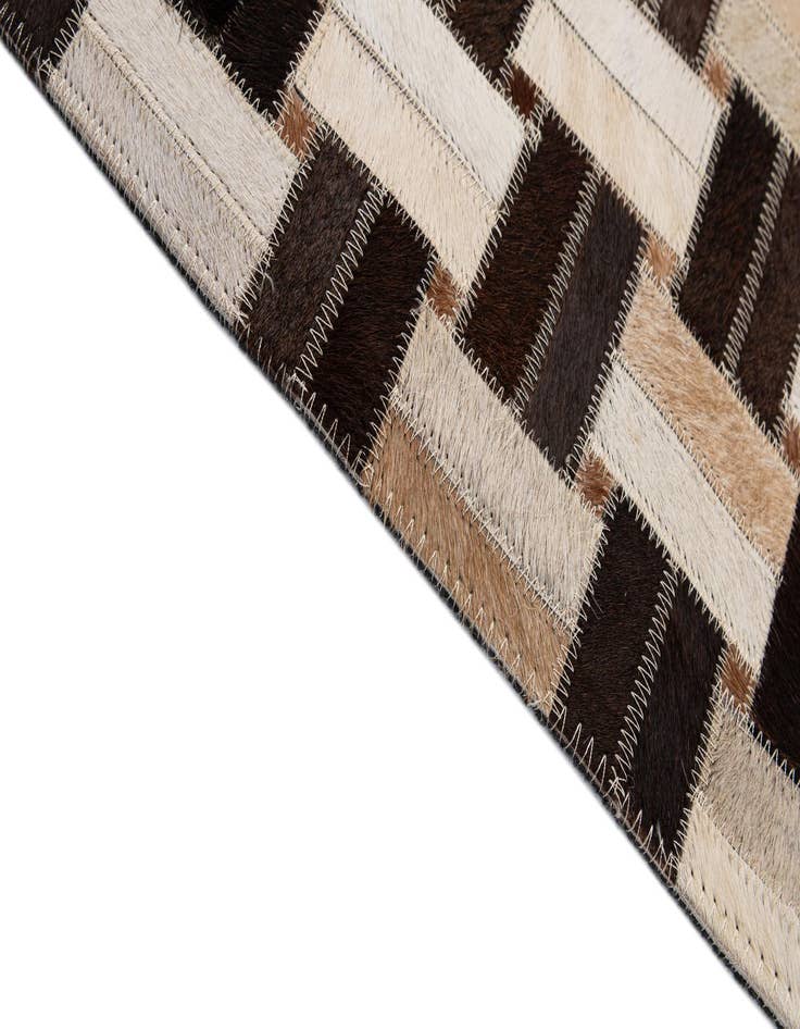 Detail image of  2' 11 x 4' 11 Cowhide - Patchwork Rug