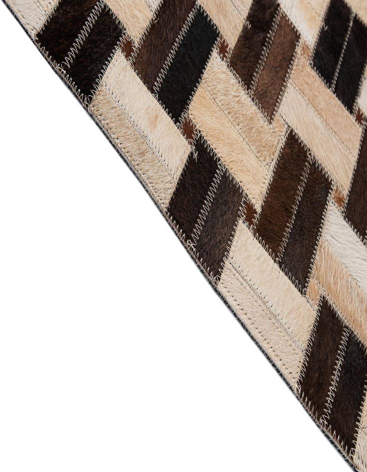 Detail image of  2' 11 x 4' 11 Cowhide - Patchwork Rug