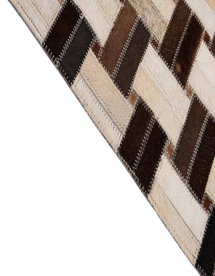 Detail image of  3' 1 x 4' 11 Cowhide - Patchwork Rug
