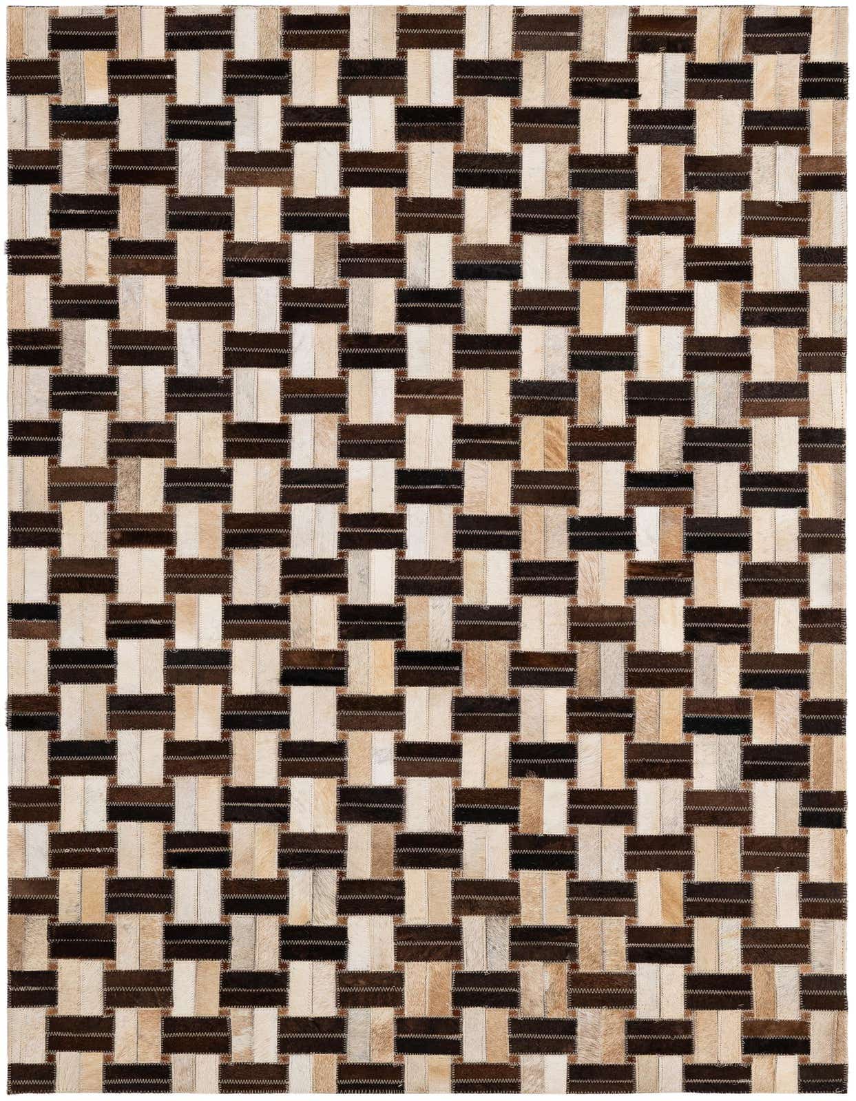 A 3x5 rectangular modern patchwork rug made from cowhide and leather, featuring a basketweave pattern in varying shades of brown, black, and cream.