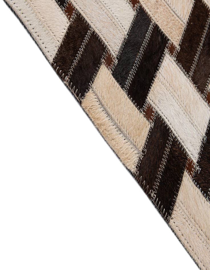 Detail image of  3' 1 x 5' Cowhide - Patchwork Rug
