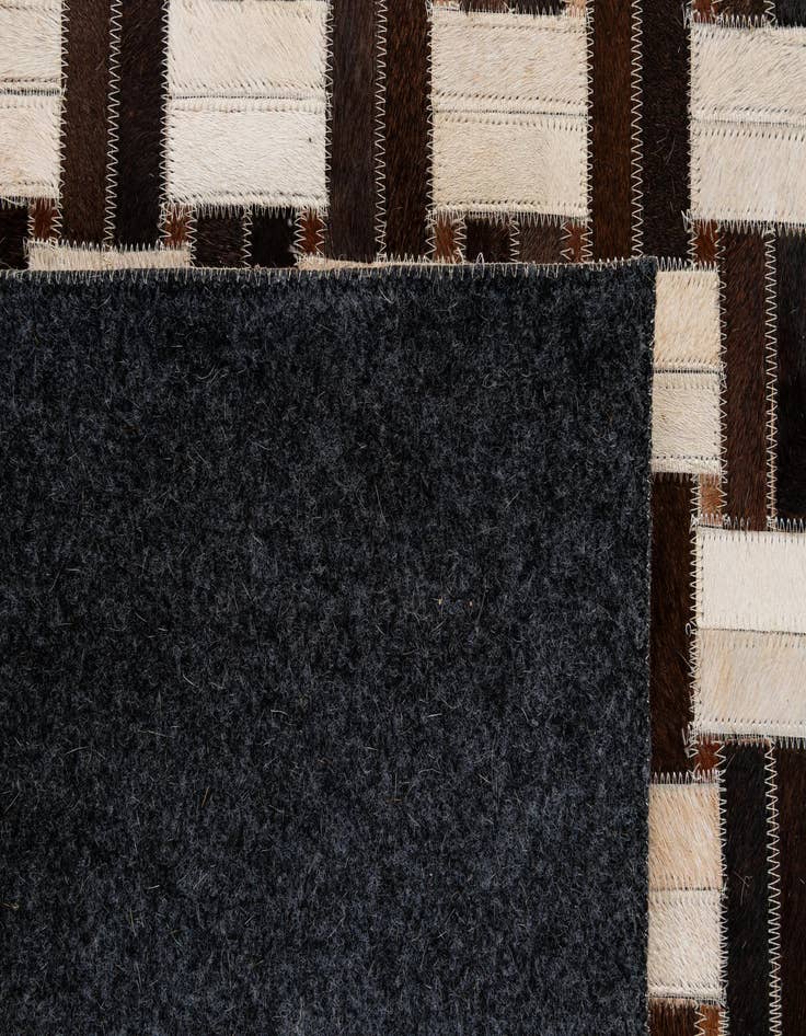 Detail image of  3' 1 x 5' Cowhide - Patchwork Rug