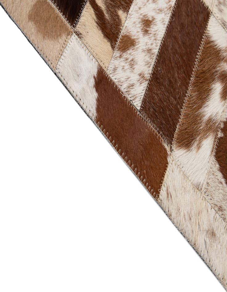Detail image of  8' 3 x 10' Cowhide - Patchwork Rug