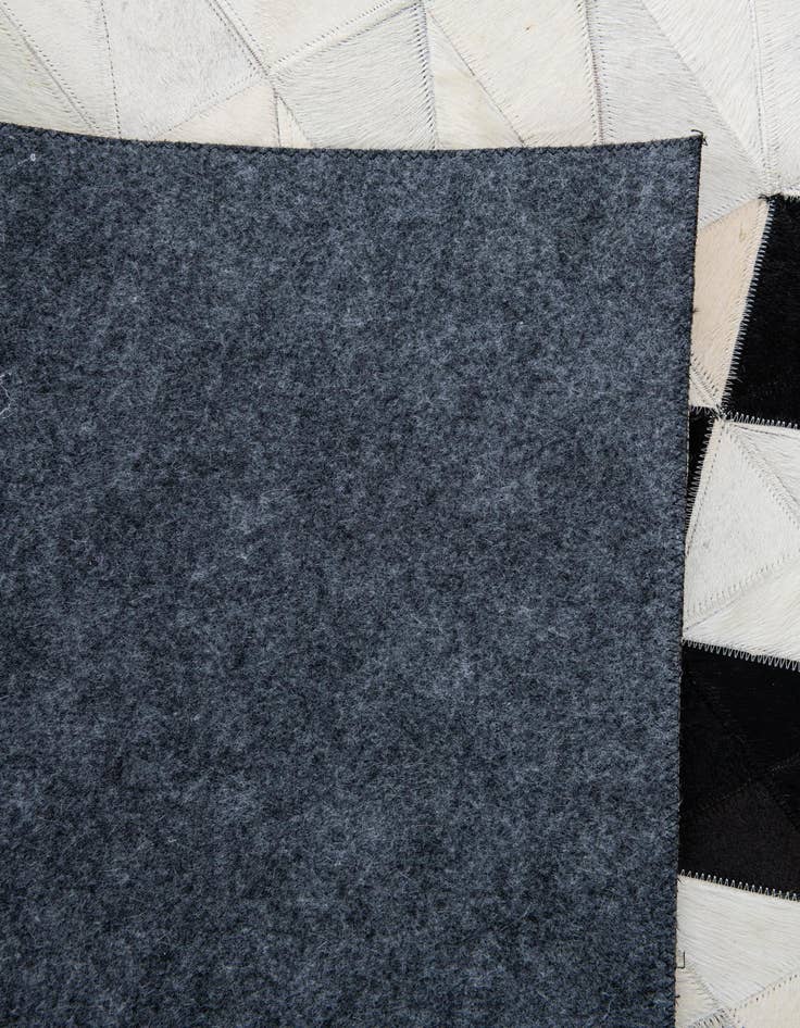 Detail image of  5' x 7' 10 Cowhide Leather Rug